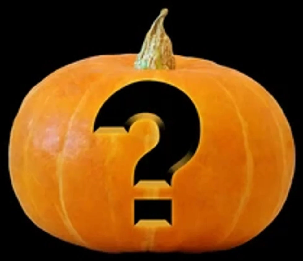 A pumpkin with a question mark carved into it.